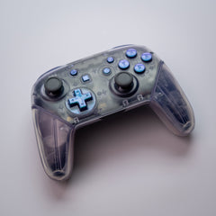 Nintendo Switch “Purple Reign” Pro-Controller Custom Clear Shells With Iridescent Purple And Blue Buttons