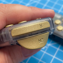 Custom Joy-Cons Retro Clear with Matte Brass-Finish Buttons Nintendo Switch Gaming Controllers