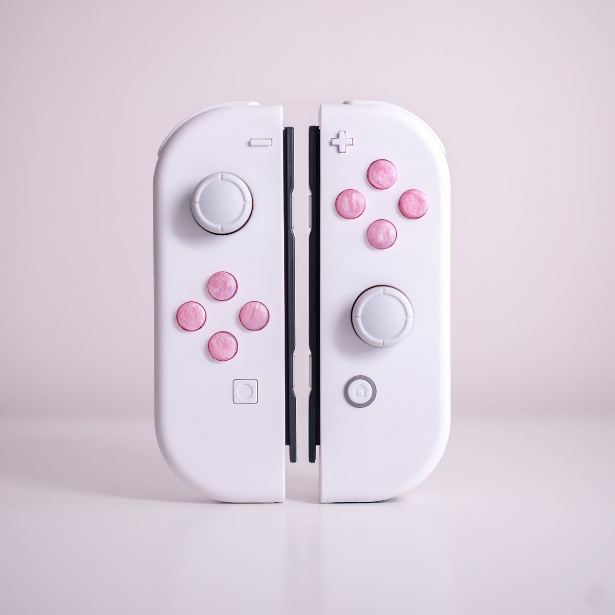 Custom Nintendo Switch Joy-Con Controllers With Glittery Pink Resin Cast Buttons