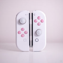 Custom Nintendo Switch Joy-Con Controllers With Glittery Pink Resin Cast Buttons