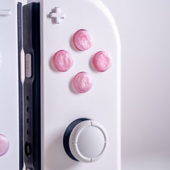 Custom Nintendo Switch Joy-Con Controllers With Glittery Pink Resin Cast Buttons
