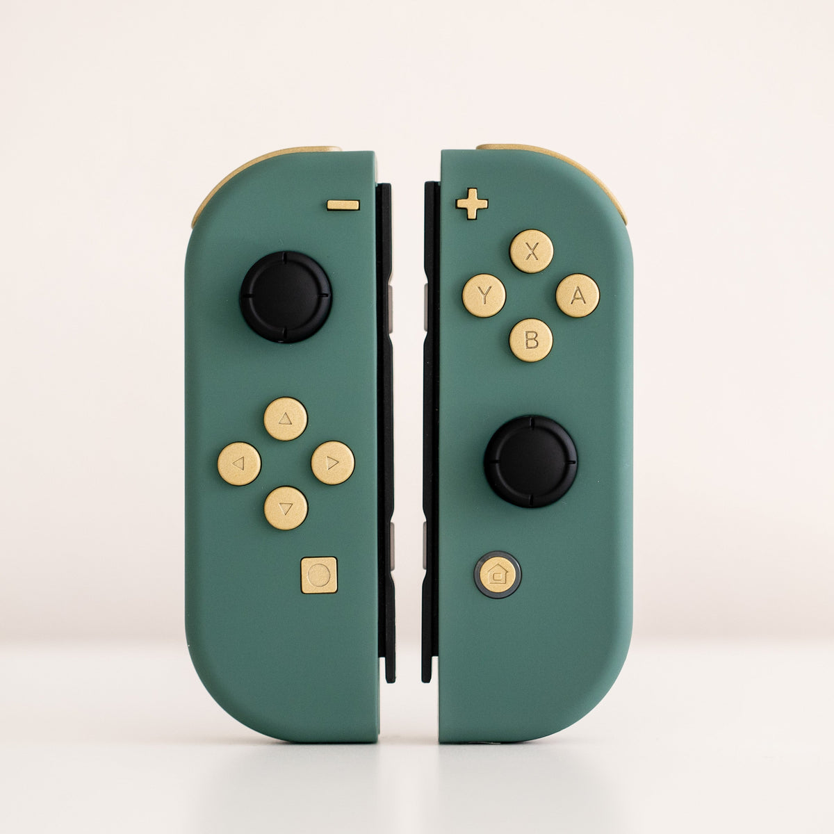 Custom Pine Green Joy-Cons for Nintendo Switch with Matte Brass Buttons