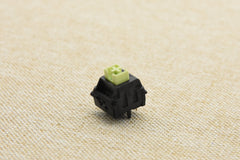WEKT XCJZ GREEN MUSTARD W LINEAR SWITCH FACTORY LUBED (10 PCS)
