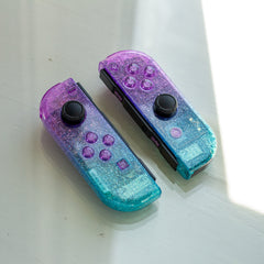 Cosmic Glitter Joy-Cons Clear Purple and Emerald Nintendo Switch Gaming Controllers