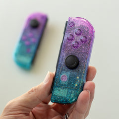 Cosmic Glitter Joy-Cons Clear Purple and Emerald Nintendo Switch Gaming Controllers
